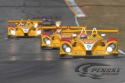 All three Penske Racing DHL Porsches battle for position at Petit Le Mans